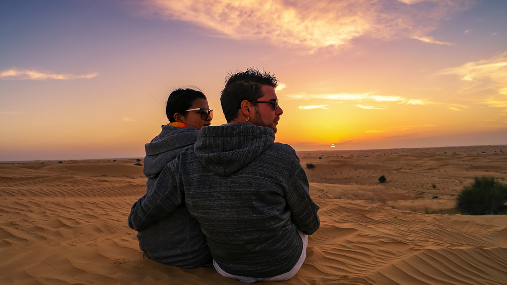 Camel ride in the red dunes of Dubai during a premium safari experience