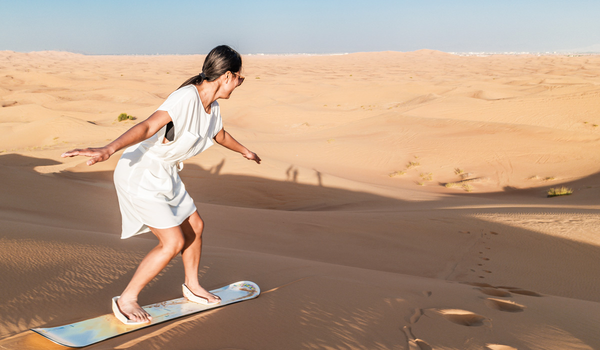 Exciting quad bike ride during small group guided red dune safari with BBQ